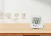 TempPro hygrometer on a wooden tabletop displaying temperature and relative humidity